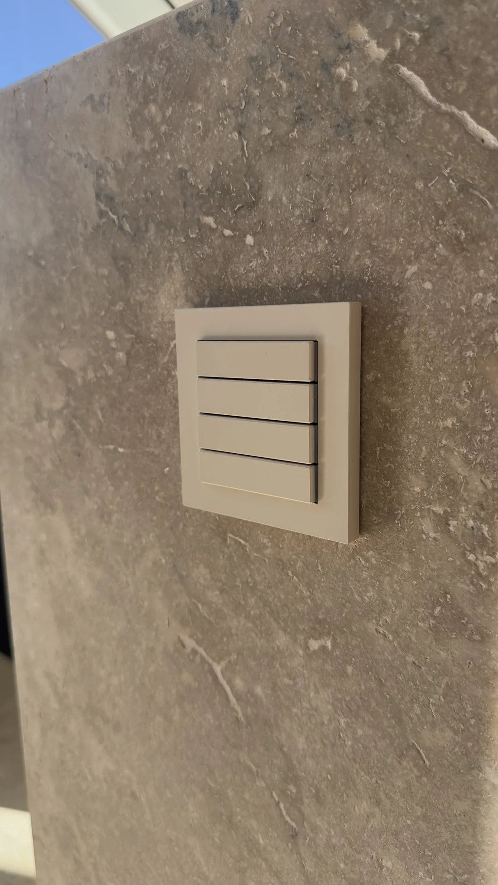 Ekinex keypad mounted flush on a marble wall