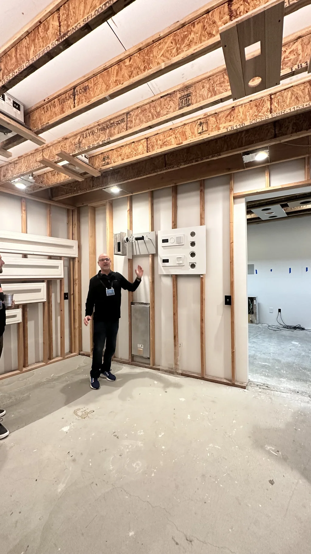 Sonance training build lab with a framed stud wall prepared for invisible speaker installation