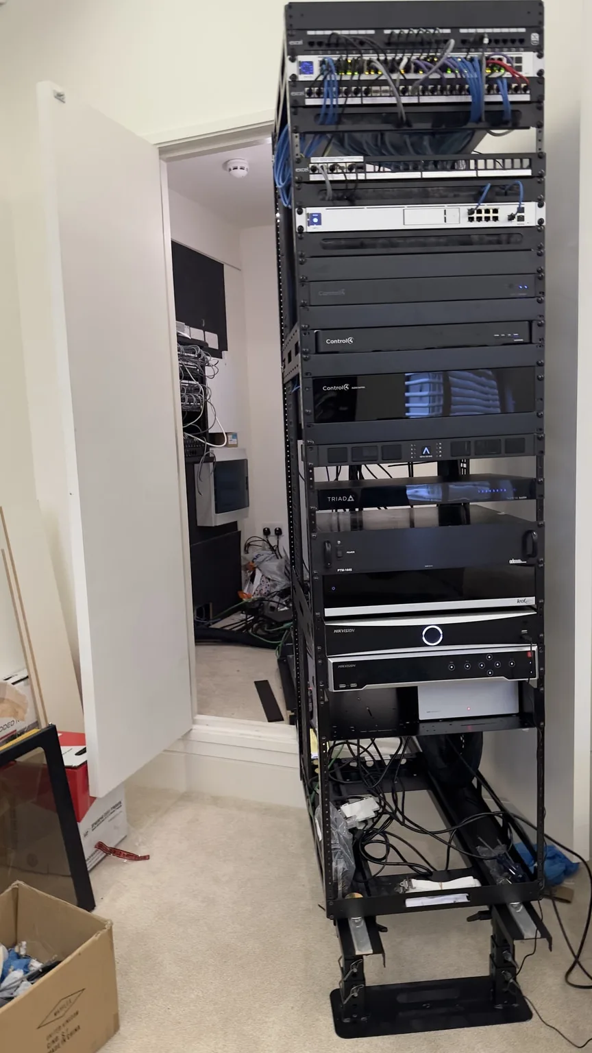 AV Cabinet Rebuild — Order from Chaos · United Kingdom · MK Iconic Solutions luxury smart living installation
